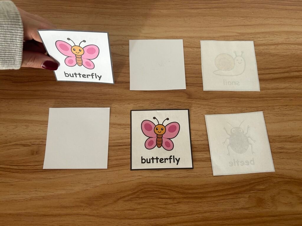 Turning over picture flashcards during a memory matching game